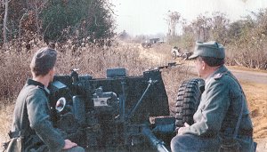 Ralph and Leon Lovett with a 3,7cm. Panzer Abwehr Kanone (PAK) 1936 in a mock ambush (closeup)