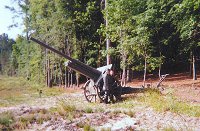 Leon and Ralph Lovett with 10cm. Kanone 1917 upright position