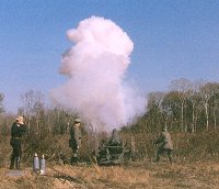 Adrian Winget, Leon Lovett, and Ralph Lovett (firing) with s.F.H. 02