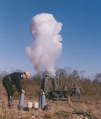 Adrian Winget, Leon Lovett, and Ralph Lovett (firing) with s.F.H. 02